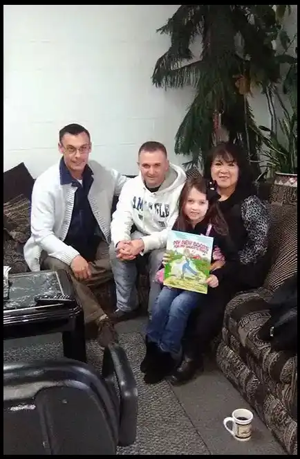 Book Author and Veteran David Haave with soldiers and families at Mrs Kims barbershop St Robert MO -- David Haave